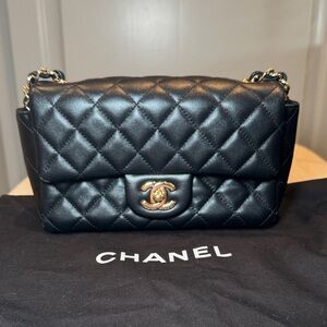 Chanel lamb skin mini flap on black with gold hardware